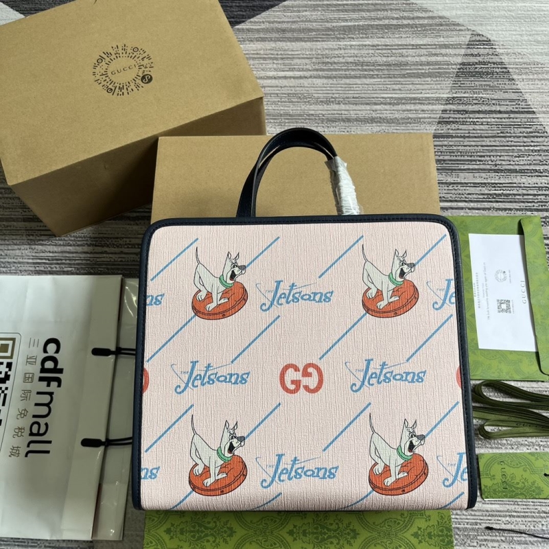 G*u*i shopping bags